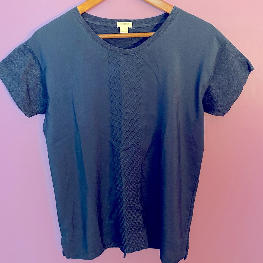 Never worn J Crew small navy short sleeve T-shirt with details on front.
